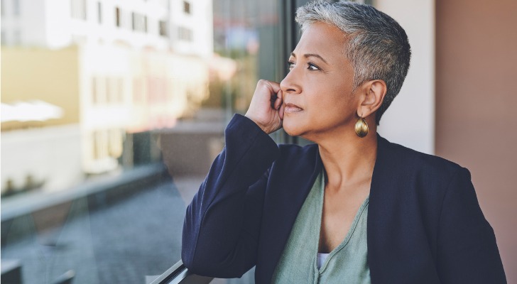 A woman thinking about her retirement plan.